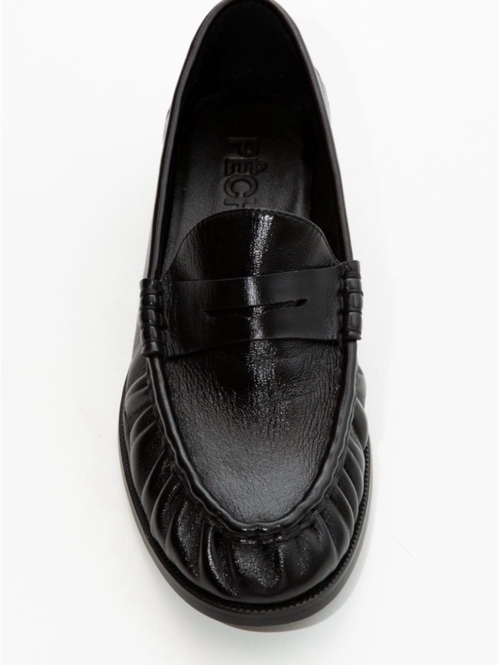 New, never worn outside.  Peche women’s Black Leather Penny Loafers